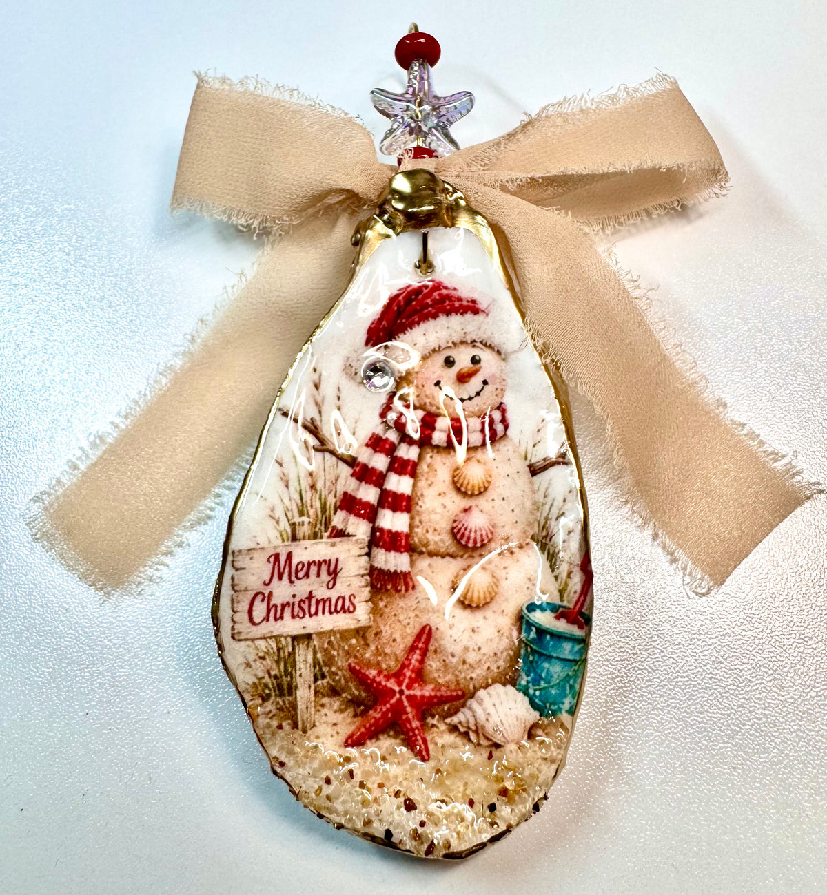 Sand snowman oyster shell ornament